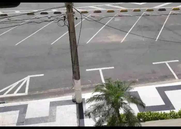 Apto a 25 metros areia PITANGUEIRAS Vista mar 4 quartos 3 banheiros 1 vaga carro Serviço de praia Guarujá